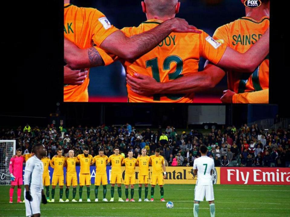 Television pictures show the Saudi players snubbing the minute's silence (Reuters)