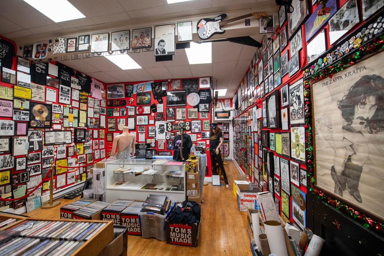 The rock collection wraps around several walls at Tom's Music Trade in Red Lion.