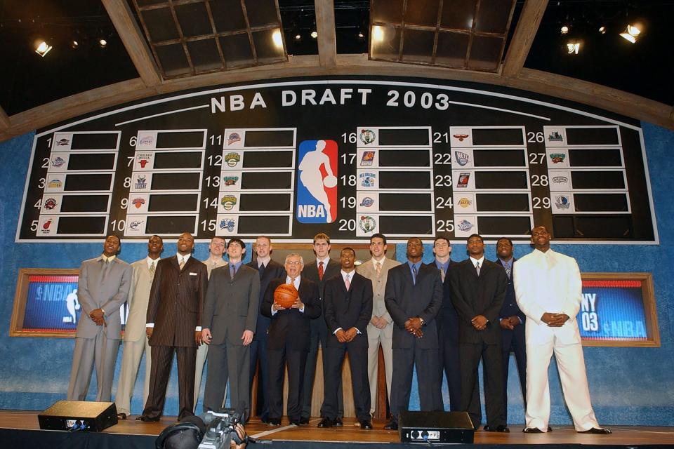 LeBron James, far right, poses for a group photo with the first-round picks of the 2003 NBA Draft on June 26, 2003, in New York.