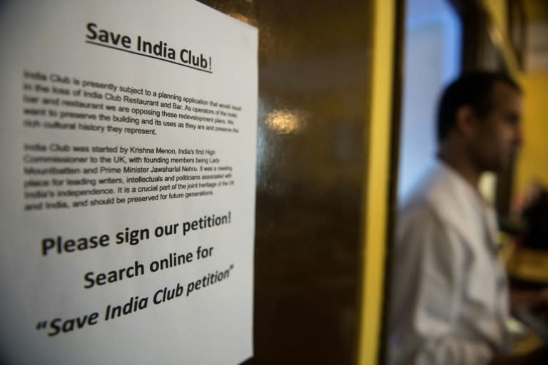 A 'save India Club' poster is pictured inside the India Club restaurant in London on October 16, 2017