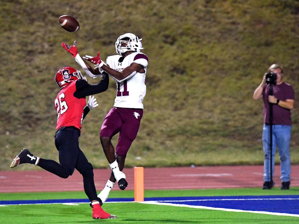 Hawley wide receiver Diontay Ramon completes a pass to score a touchdown as Sonora defensive back Juan Castillo covers. Ramon caught two touchdown passes.