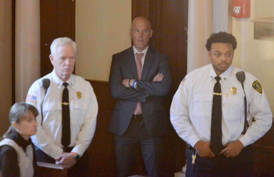 Cape and Islands District Attorney Robert Galibois, center, listens to the arraignment of Randy Patterson-Gerber in Barnstable Superior Court Monday afternoon.