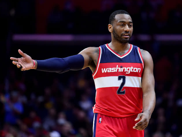 John Wall in the road reds. (Getty)