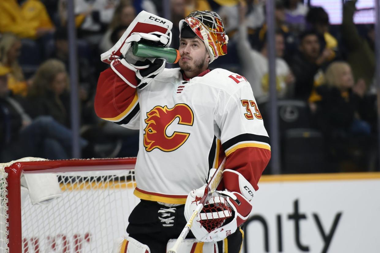 <span class="caption">A Czech-born goaltender for a Canadian hockey team wears a jersey recalling the 1864 burning of Atlanta, Georgia.</span> <span class="attribution"><a class="link " href="http://www.apimages.com/metadata/Index/Flames-Predators-Hockey/a0c87ed448414065a8e72a4c6e41fae8/128/0" rel="nofollow noopener" target="_blank" data-ylk="slk:AP Photo/Mark Zaleski;elm:context_link;itc:0;sec:content-canvas">AP Photo/Mark Zaleski</a></span>