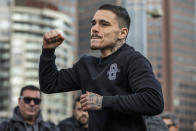 Australian boxer George Kambosos gestures during a public training session at Federation Square in Melbourne, Australia, Thursday, June 2, 2022. U.S.-based Australian boxer Kambosos will put his WBA, IBF and WBO belts on the line on Sunday at Melbourne's Marvel Stadium to fight American Devin Haney. (Diego Fedele/AAP Image via AP)