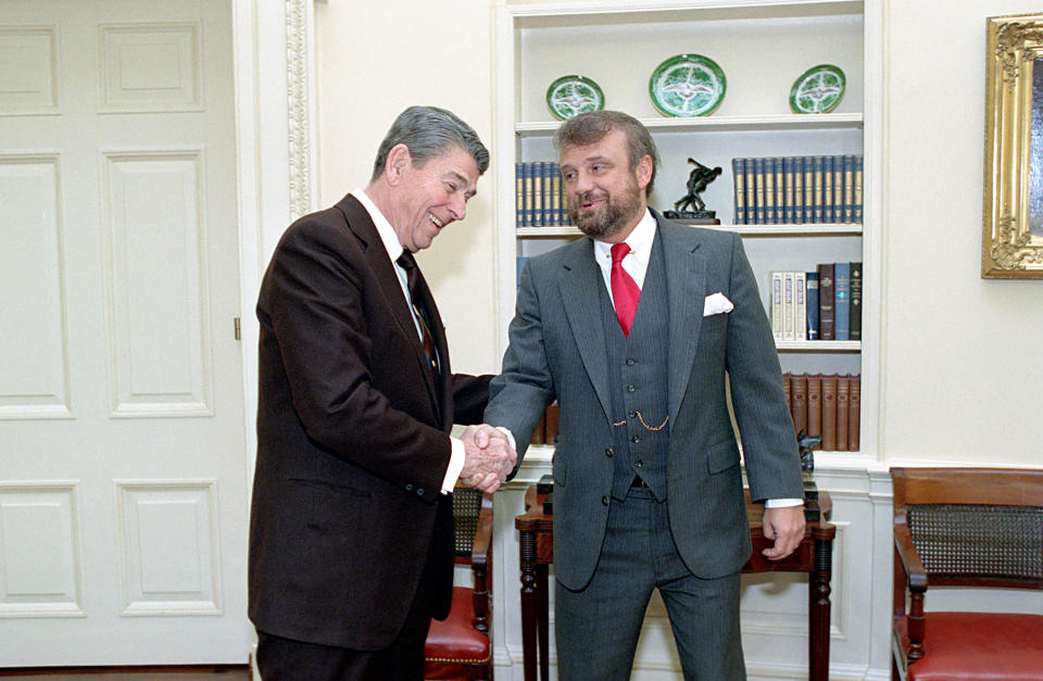 Tony Dolan (right, in 1989) served as Ronald Reagan’s speechwriter for all eight years of Reagan’s presidency. - Credit: HUM Images/Universal Images Group via Getty Images