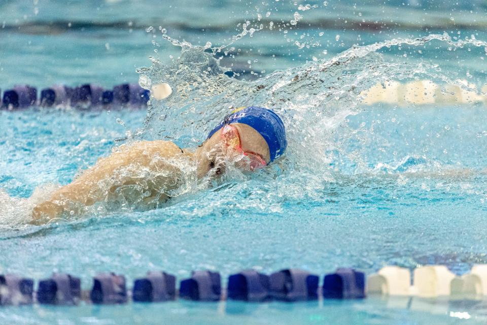 Stillwater's Avery Littlefield swims in the 100-yard freestyle during the Class 6A state finals Friday at Edmond Schools Aquatic Center.