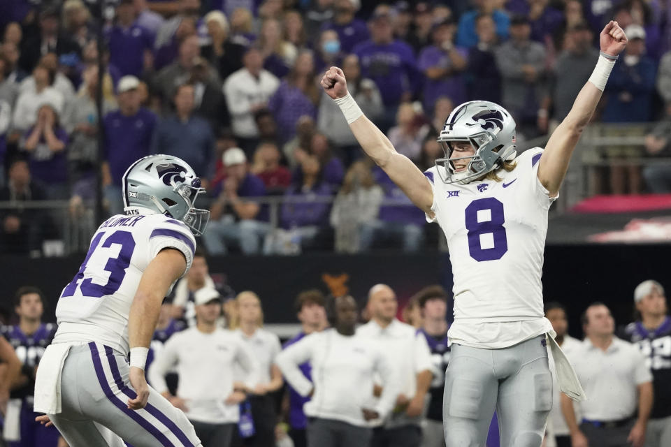 Kansas State's Ty Zentner (8) and Jack Blumer (43) celebrates Zentner's field goal in overtime of the Big 12 Conference championship NCAA college football game against TCU, Saturday, Dec. 3, 2022, in Arlington, Texas. (AP Photo/LM Otero)