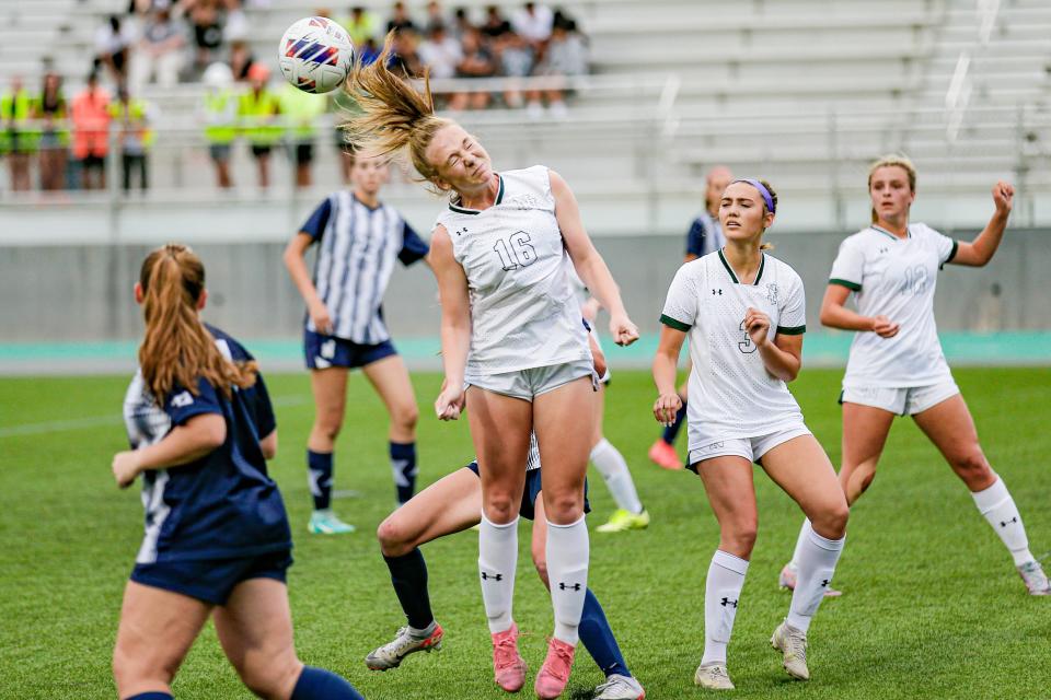 Norman North's Makenna Adam (16) heads the ball during the Class 6A girls state championship soccer game between Edmond North and Norman North on Saturday, May 11, 2024, at Taft Stadium in Oklahoma City. do.