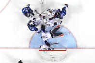 <p>Madeline Rooney #35 of the United States lays on the ice after a play against Team Finland during the Women’s Ice Hockey Preliminary Round – Group A game on day two of the PyeongChang 2018 Winter Olympic Games at Kwandong Hockey Centre on February 11, 2018 in Gangneung, South Korea. (Photo by Bruce Bennett/Getty Images) </p>