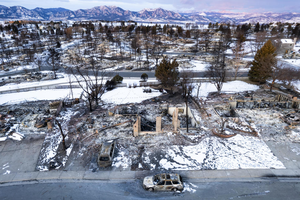 In this aerial view, burned homes sit in a neighborhood decimated by the Marshall Fire on January 4, 2022 in Louisville, Colorado.  / Credit: Michael Ciaglo / Getty Images