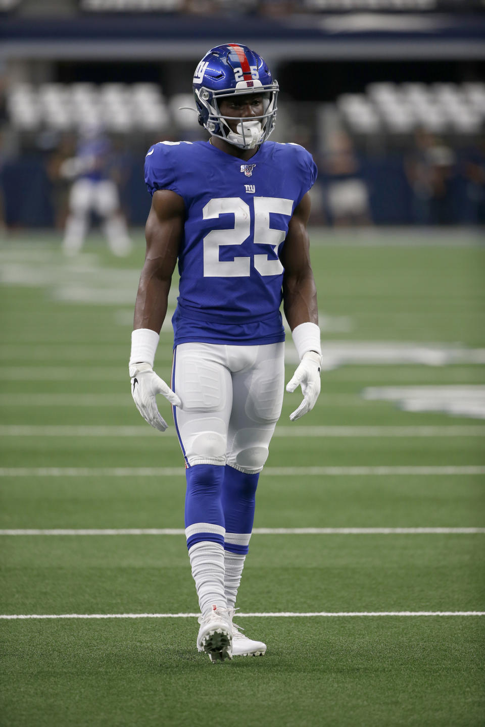 FILE - In this Sunday, Sept. 8, 2019 file photo, New York Giants defensive back Corey Ballentine (25) warms up before a NFL football game against the Dallas Cowboys in Arlington, Texas. A day after making his NFL debut with the New York Giants, Ballentine testified at a preliminary hearing about the day his best friend and former Washburn University teammate Dwane Simmons was shot to death. (AP Photo/Ron Jenkins, File)