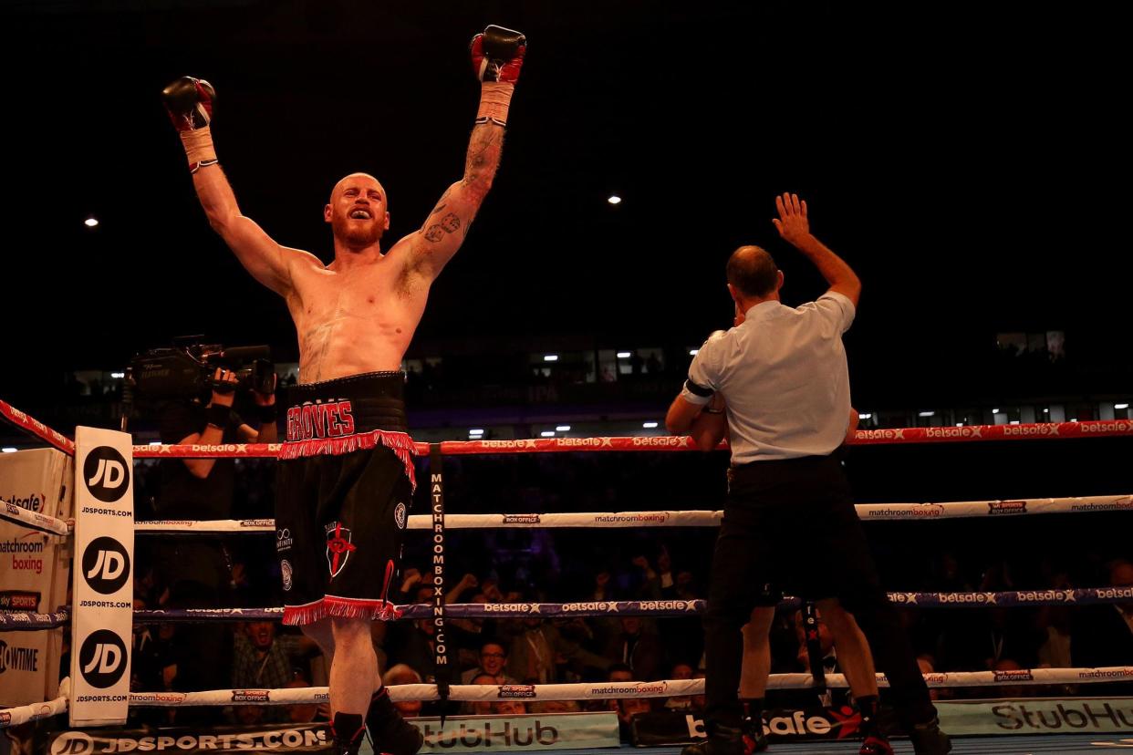 And the new: George Groves celebrates his victory over Fedor Chudinov: Getty Images