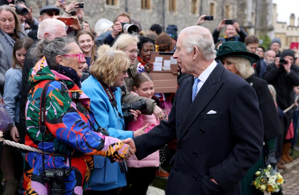 Crowds were delighted to meet Charles and Camilla in a surprise walkabout (Reuters)