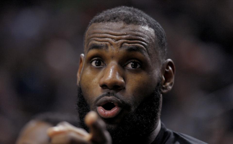 LeBron James feigns surprise. (AP)