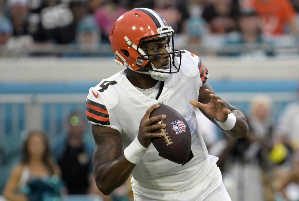 FILE - Cleveland Browns quarterback Deshaun Watson sets up to throw during the first half of a preseason NFL football game against the Jacksonville Jaguars, Friday, Aug. 12, 2022, in Jacksonville, Fla. Professionals attending the American Massage Therapy Association national convention have gathered to talk about their work. It's a job that can be difficult and the pandemic, tragic murders in Georgia and the lingering stain of NFL quarterback Deshaun Watson's ongoing case have perpetuated the sex worker stigma around the industry. (AP Photo/Phelan M. Ebenhack, File)