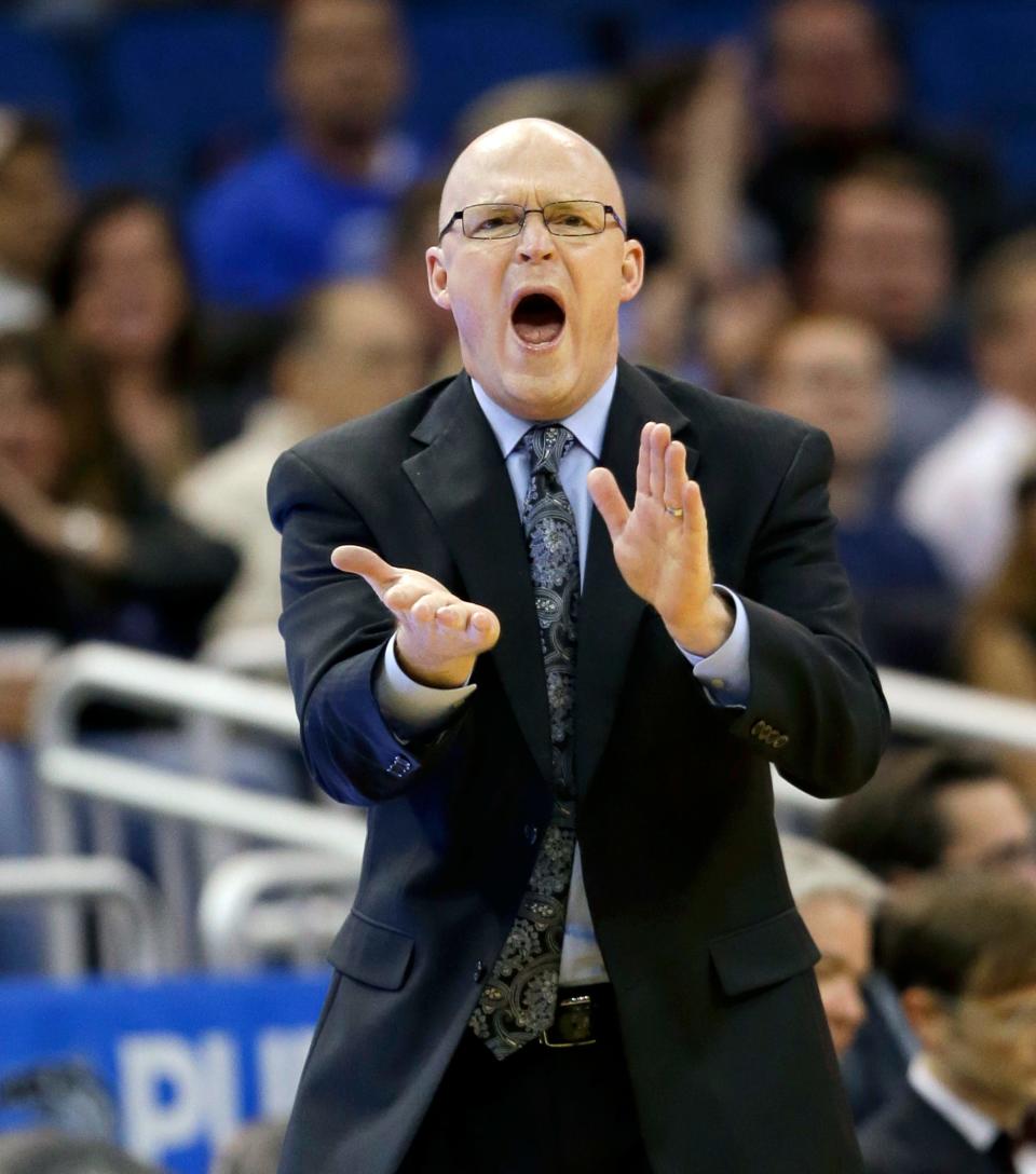 Orlando Magic coach Scott Skiles encourages his players against the San Antonio Spurs on Feb. 16, 2016, in Orlando.