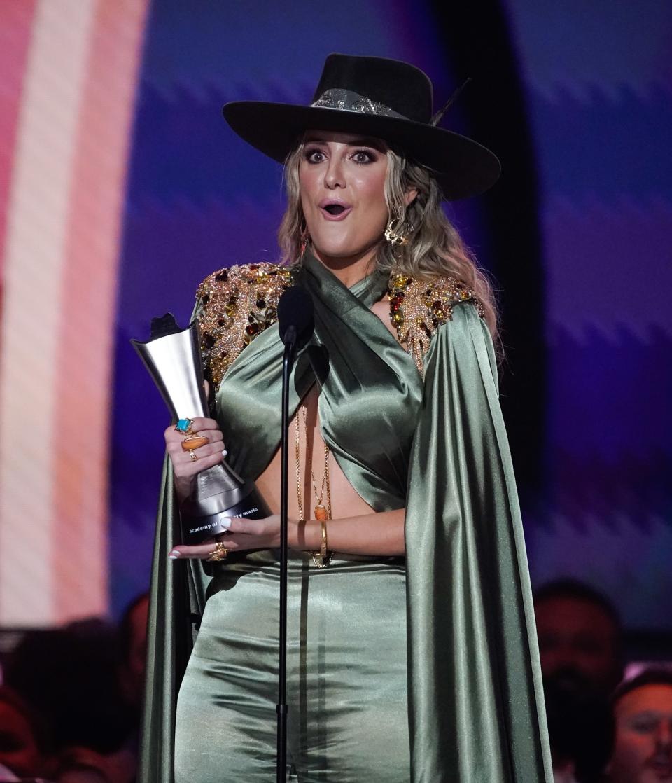 Lainey Wilson accepts the Female Artist of the Year award during the 58th ACM Awards at the Ford Center at the Star in Frisco Texas, on Thursday, May 11, 2023.