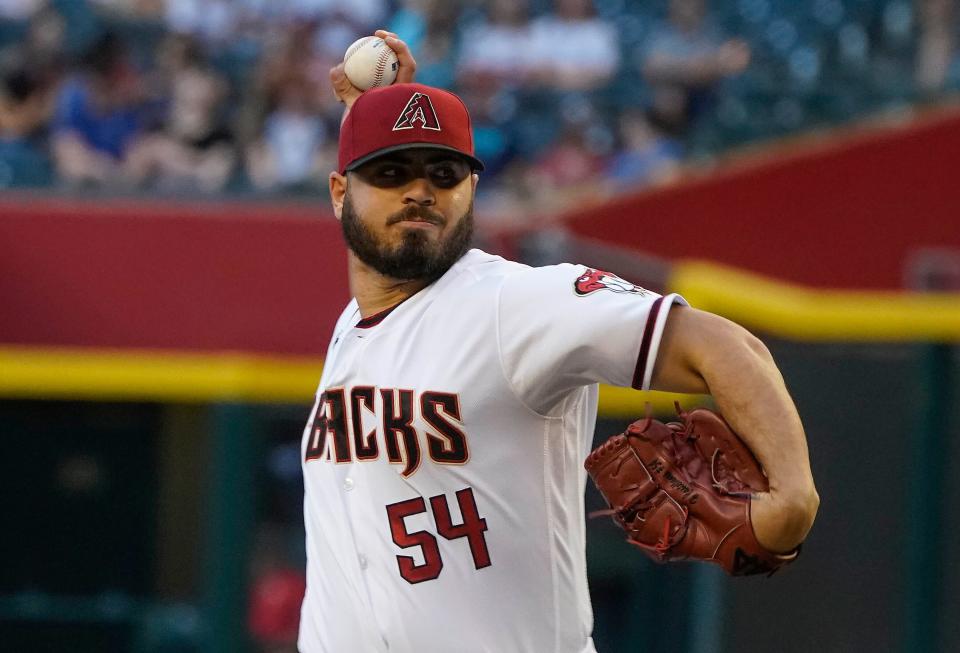 Arizona Diamondbacks pitcher Humberto Castellanos (54) delivers against the Miami Marlins during the first inning of a baseball game Monday, May 9, 2022, in Phoenix.