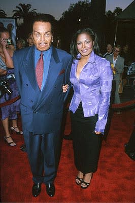 Janet Jackson with Joe, the patriarch of the Jackson clan, at the Universal City premiere of Universal's Nutty Professor II: The Klumps