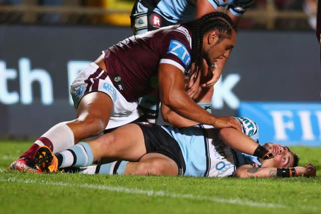 Bird lies dazed after being hit high by Taupau in 2016. Pic: Getty