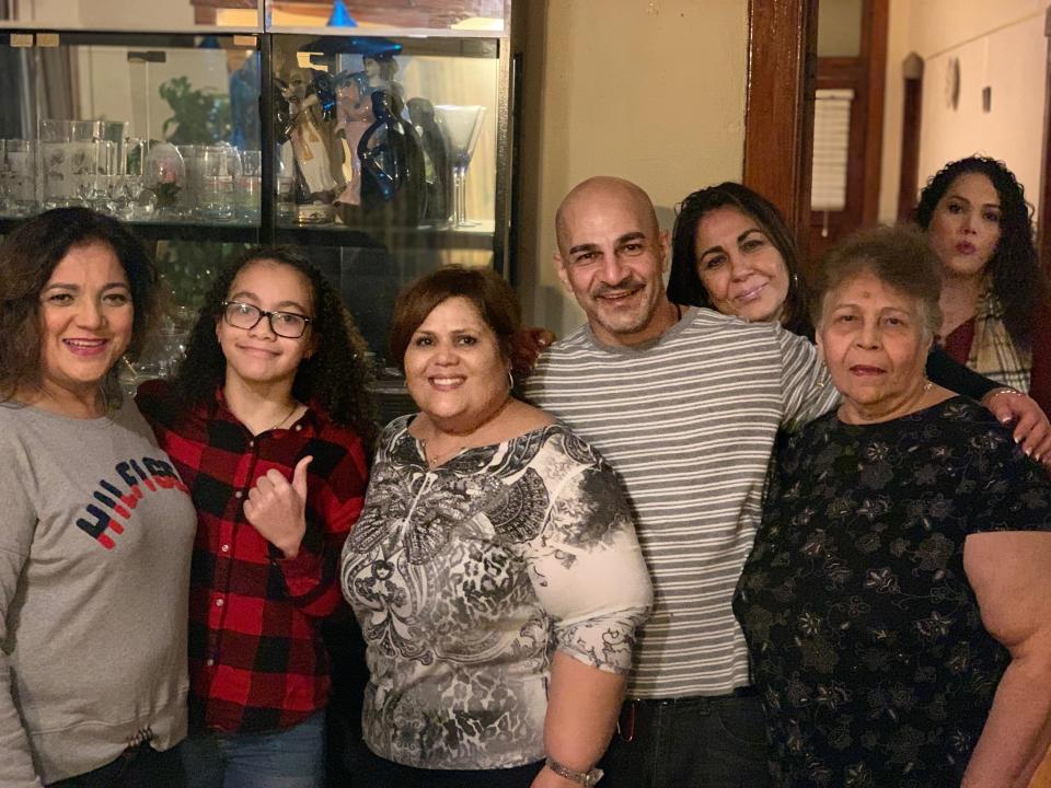 Reynaldo Munoz, center, and his family. Munoz now lives in Tampa, Florida.