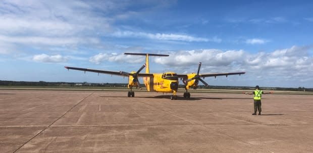 The CC-115 Buffalo made one last flyover the city then touched down at the airport, completing its final flight.  (Nancy Russell/CBC - image credit)