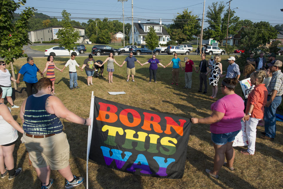 Supporters of same-sex marriage form a prayer circle during a protest in front of the Rowan County Courthouse, Sept. 4, 2015, in Morehead, Ky. (Photo: Ty Wright/Getty Images)