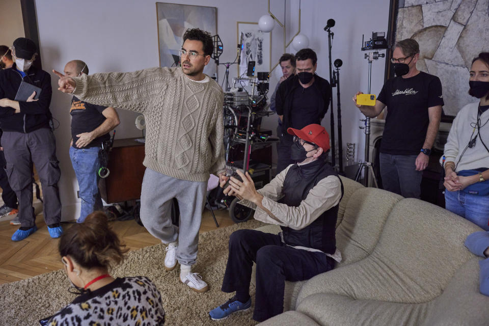 Center) Writer, Director, Producer, Actor Daniel Levy with crew members on the set of Good Grief. (Chris Baker / Netflix)