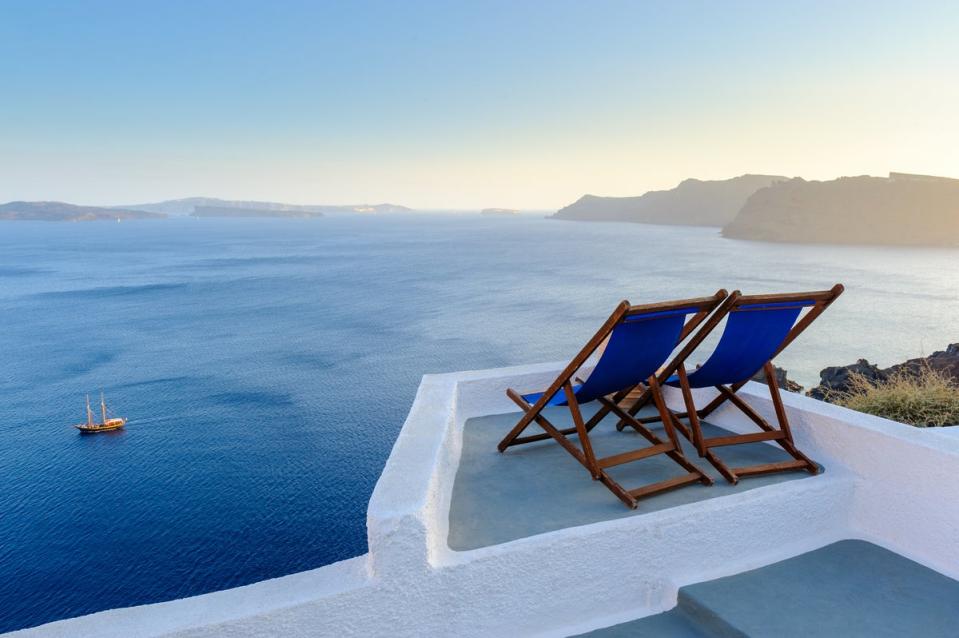 Take in Santorini’s spectacular sunsets with your significant other (Getty Images)