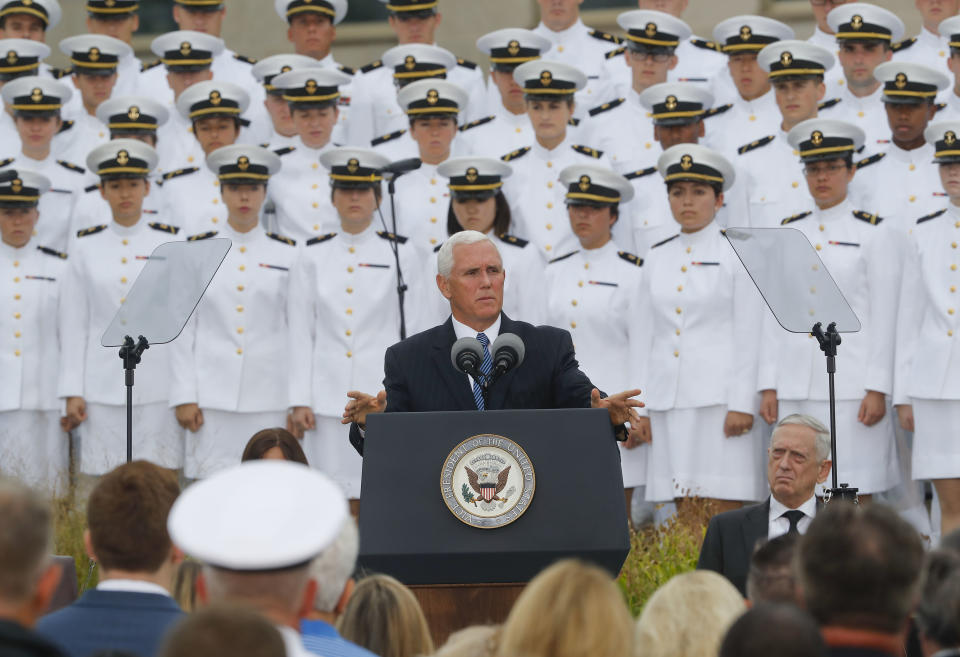 <p>Vice President Mike Pence, center, speaks during the September 11th Pentagon Memorial Observance at the Pentagon on the 17th anniversary of the September 11th attacks, Tuesday, Sept. 11, 2018. Also on stage is Defense Secretary Jame Mattis, right. (AP Photo/Pablo Martinez Monsivais) </p>