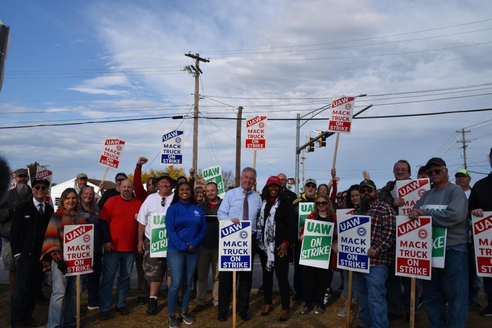 U.S. Rep. David Trone, D-6th, who is seeking the Democratic nomination for Maryland's next U.S. senator, stands with members of the United Auto Workers Local 171, as well as some Hagerstown-area elected officials.