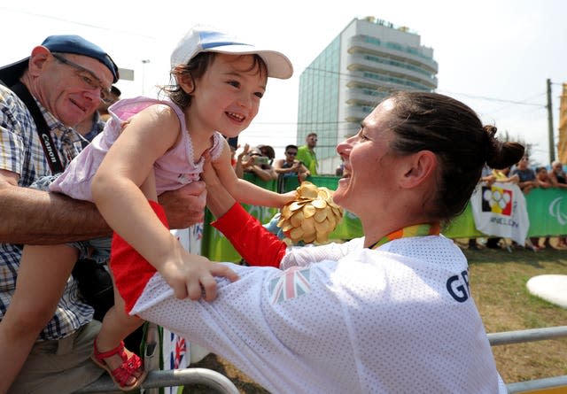 Dame Sarah Storey celebrates with daughter Louisa after winning gold at Rio 2016