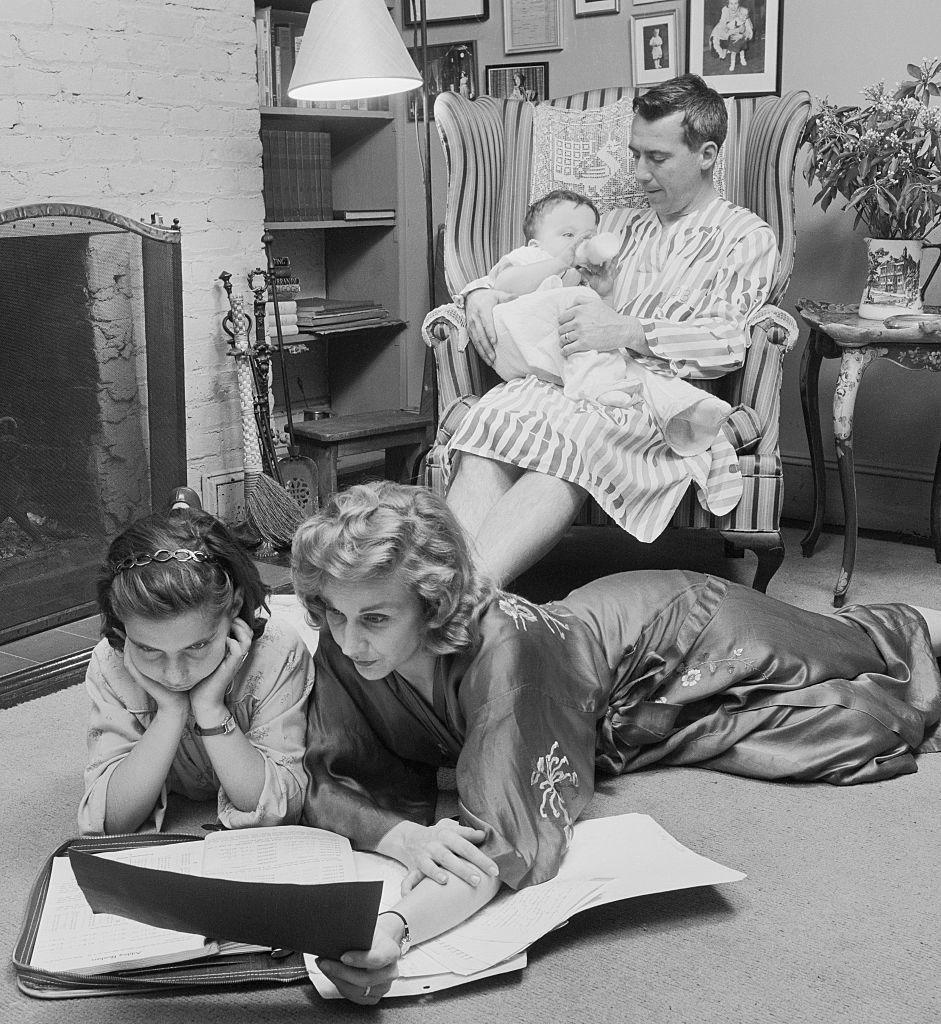 <p>Born in Detroit, actress Kim Hunter is pictured in her New York home with her second husband, Robert Emmett, and her two children in 1956. In 1951, she won both an Academy Award and a Golden Globe for her performance in <em>A Streetcar Named Desire.</em></p>