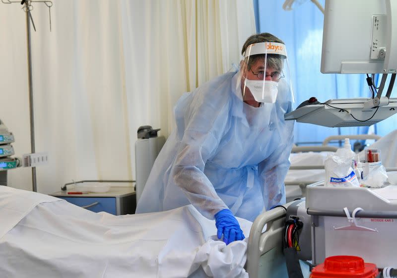 A member of the medical personnel wearing a full protective suit works in the intensive care unit at Maastricht UMC+ Hospital