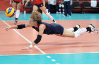 Maria Bertelli #7 of Great Britain dives for the ball in the third set against Russia during Women's Volleyball on Day 1 of the London 2012 Olympic Games at Earls Court on July 28, 2012 in London, England. (Photo by Elsa/Getty Images)