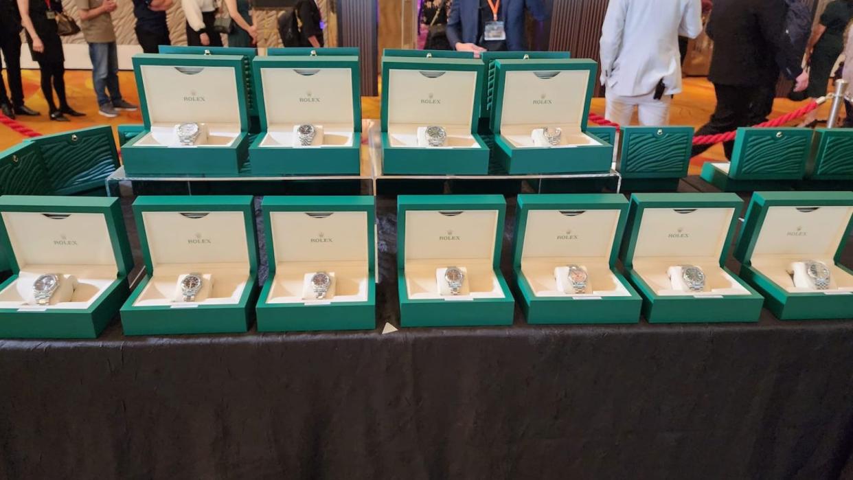 A staff member shared a picture of the display of Rolex watches at the dinner. 