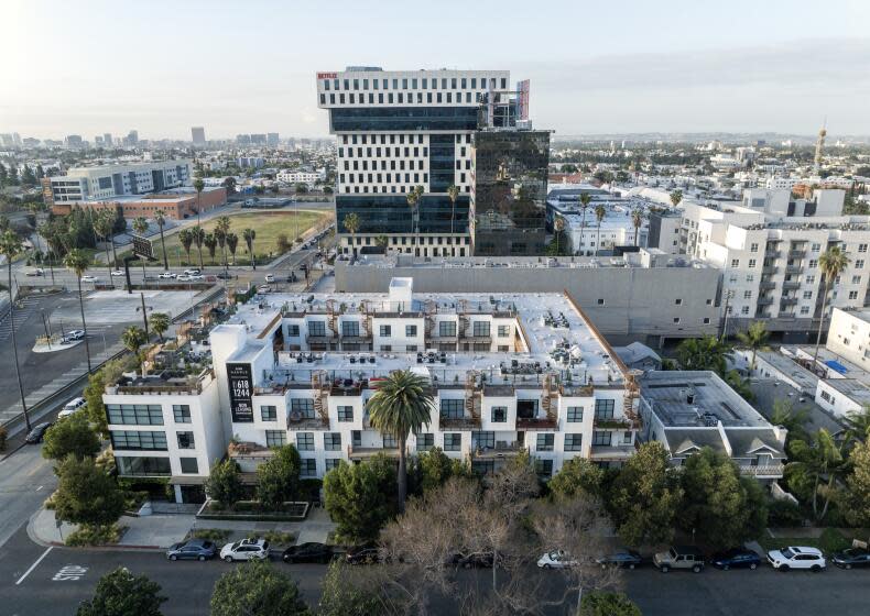 LOS ANGELES, CA - APRIL 24: The apartment building at 5800 Harold Way in Los Angeles, CA (foreground) is under rent control. Most people assume rent control in L.A. applies to buildings built before 1978 but because of a relatively unknown city law, there are thousands of new buildings that also fall under rent control. Photographed on Harold Way in Los Angeles, CA on Wednesday, April 24, 2024. (Myung J. Chun / Los Angeles Times)