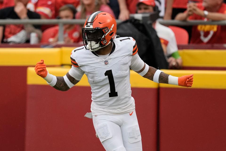 Browns safety Juan Thornhill celebrates after intercepting a pass and running it back for a touchdown at the Kansas City Chiefs, Saturday, Aug. 26, 2023.