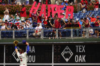 FILE - In this Sept. 12, 2021, file photo, Philadelphia Phillies' Bryce Harper cheers with fans before a baseball game against the Colorado Rockies in Philadelphia. The Phillies are trying to make the playoffs for the first time since 2011. Harper has slugged the Phillies into contention since the All-Star break and has them facing a make-or-break series in Atlanta. (AP Photo/Matt Slocum, File)