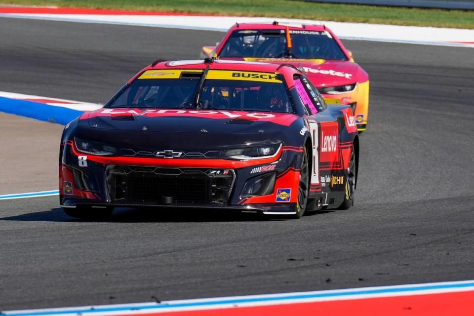 Oct 7, 2023; Concord, North Carolina, USA; NASCAR Cup Series driver Kyle Busch (8) followed by driver Ricky Stenhouse Jr. (47) during Cup practice and qualifying at Charlotte Motor Speedway Road Course.