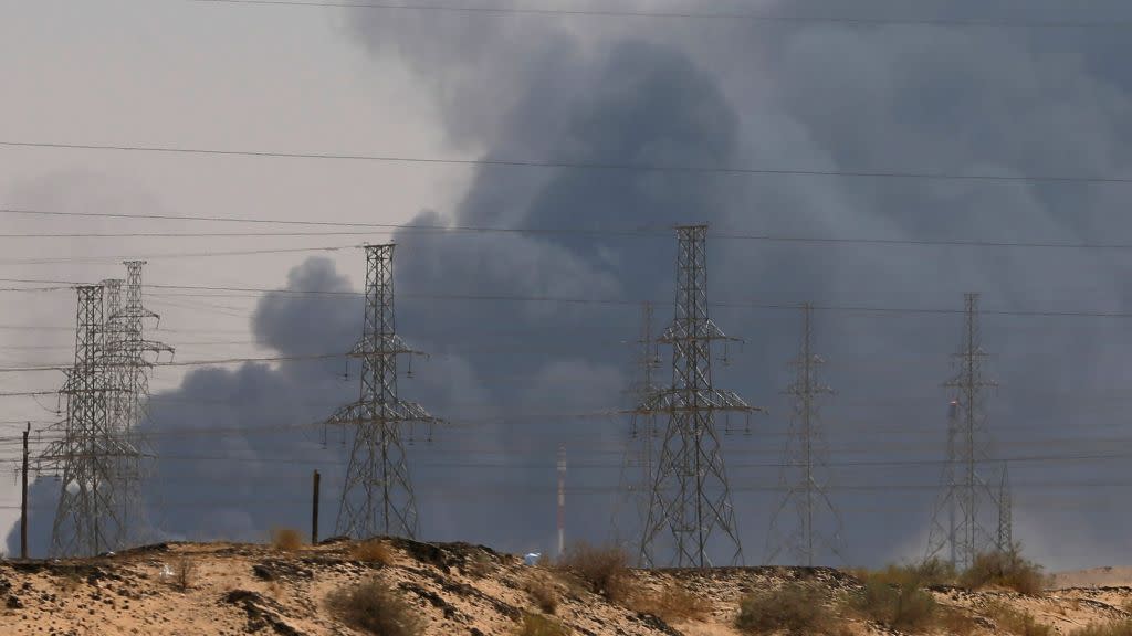 Smoke is seen following a fire at an Aramco factory in Abqaiq, Saudi Arabia, September 14, 2019.