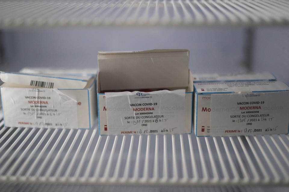 Boxes of the Moderna COVID-19 vaccine are pictured in a fridge at a vaccination center in Le Cannet, southern France, Thursday Jan. 21, 2021. (AP Photo/Daniel Cole)