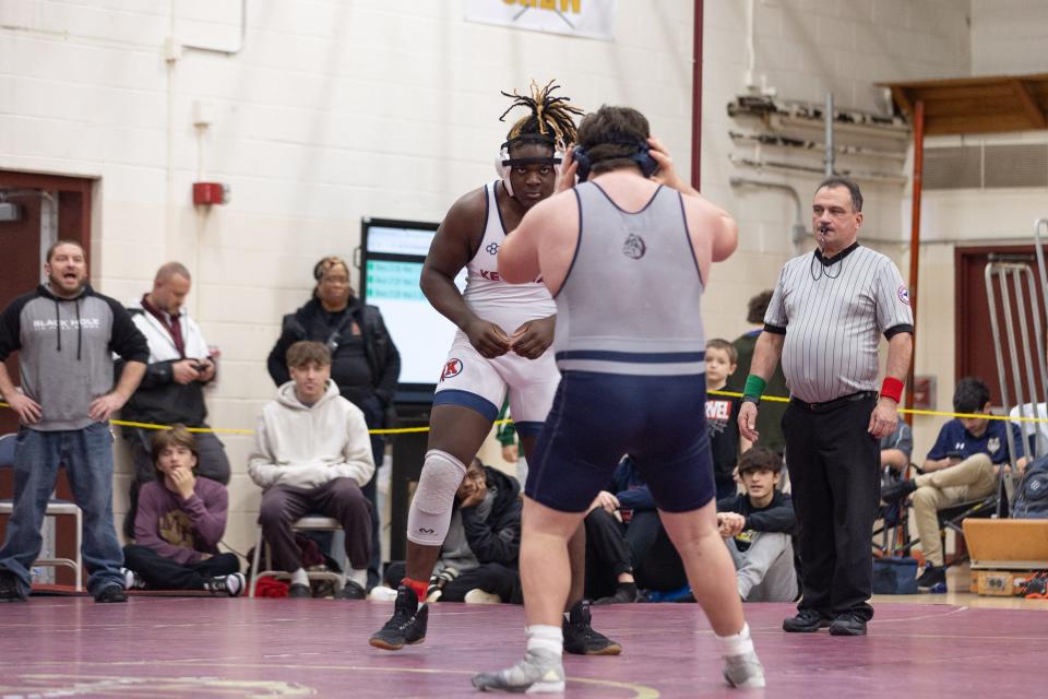 Ketcham's Raheem Adebola, left, wrestles Hewlett's Jordan Sita in the 57th Mid-Hudson wrestling Tournament in LaGrange, NY on December 28, 2023.