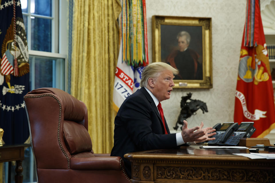 President Donald Trump speaks during an interview with The Associated Press in the Oval Office of the White House, Tuesday, Oct. 16, 2018, in Washington. (AP Photo/Evan Vucci)