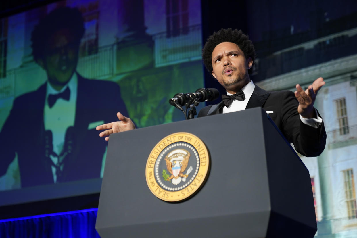 Trevor Noah, wearing a tuxedo, speaks at the White House Correspondents' Association dinner.