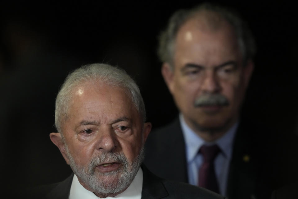 Brazilian President-elect Luiz Inacio Lula da Silva, accompanied by economist Aloizio Mercadante, speaks during a press conference after meeting with the president of the Supreme Electoral Court, in Brasilia, Brazil, Wednesday, Nov. 9, 2022. On his first day in Brazil's capital after winning the runoff election, Da Silva is meeting with the leaders of each house of Congress ahead of his inauguration on Jan. 1. (AP Photo/Eraldo Peres)
