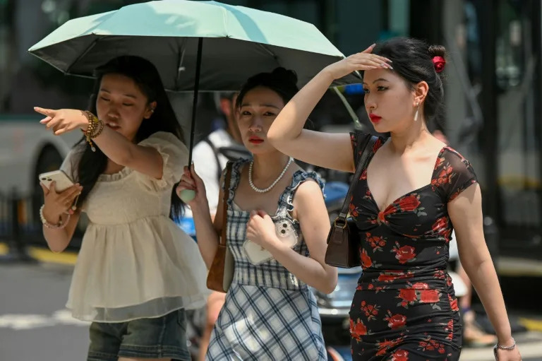 Shanghai residents swelter as China's largest city records its hottest May day in 100 years of 36.1 degrees Celsius (97 degrees Fahrenheit)