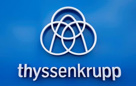 FILE PHOTO: Thyssenkrupp's logo is seen close to the elevator test tower in Rottweil, Germany, September 25, 2017. REUTERS/Michaela Rehle/File Photo