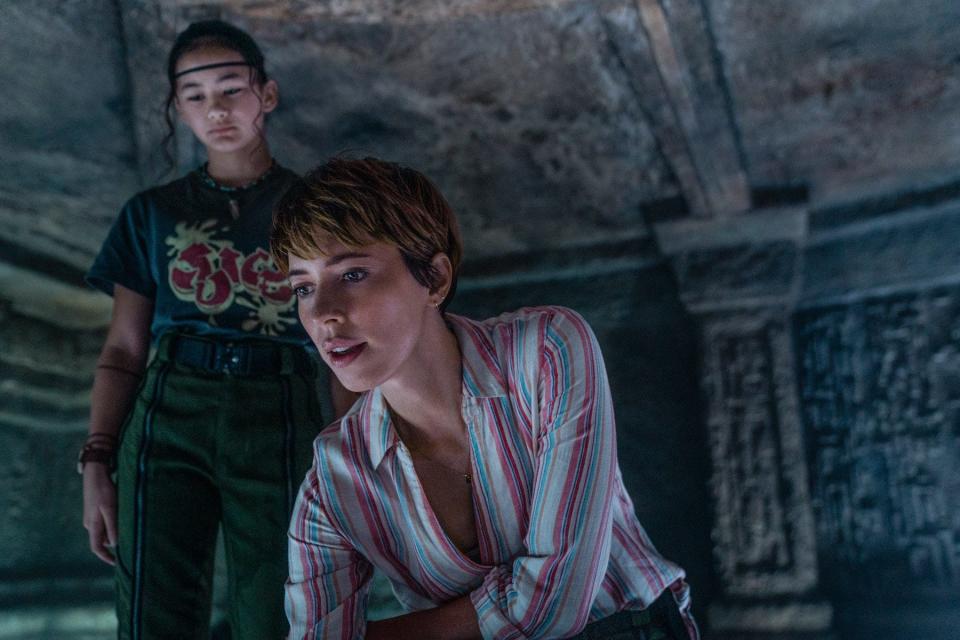 Kaylee Hottle (left) as Jia and Rebecca Hall as Dr. Ilene Andrews take center stage in "Godzilla x Kong: The New Empire," which finds the Titans battling their alter egos.